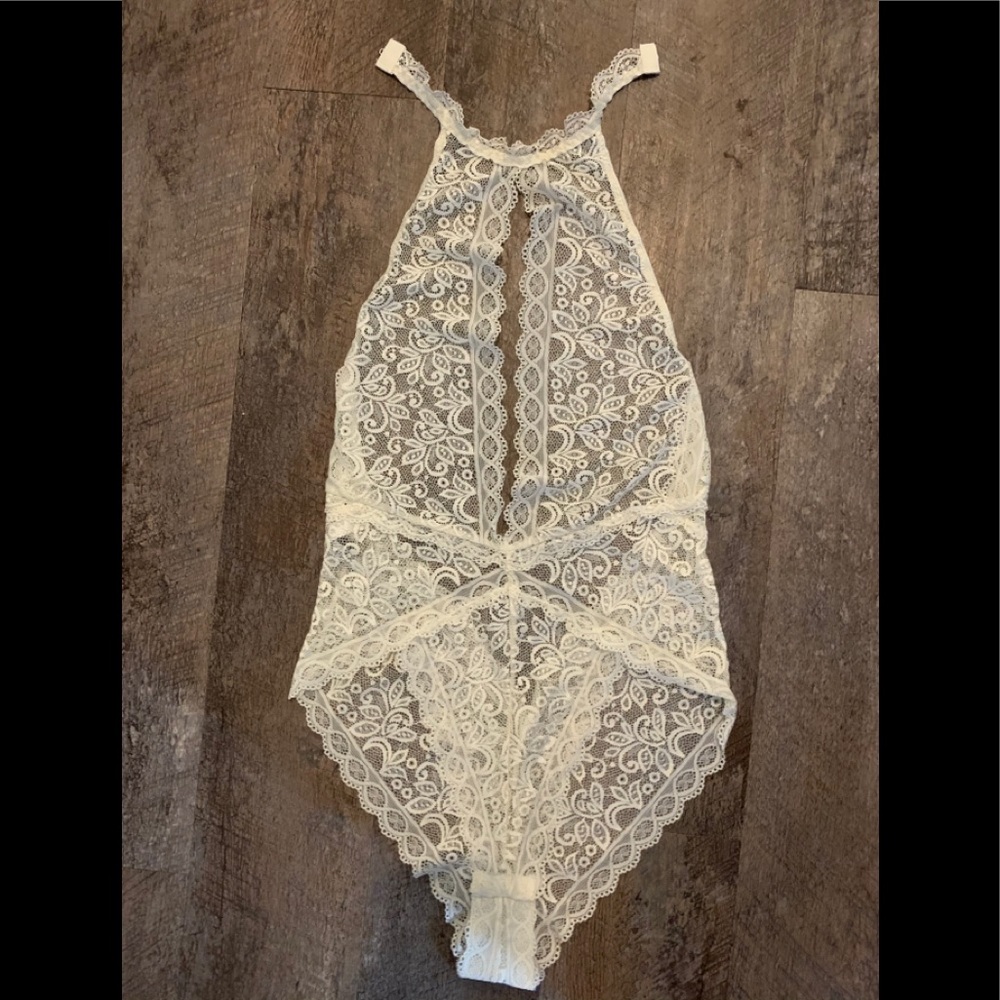 Never worn Off white lingerie with low v